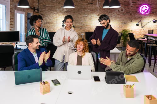 Preview: Team congratulating project manager clapping in modern office