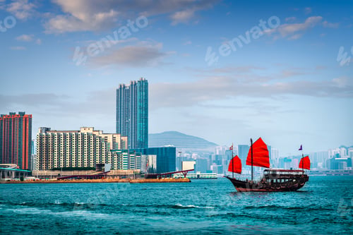 Preview: Hong Kong, China with a traditional junk boat in the harbor