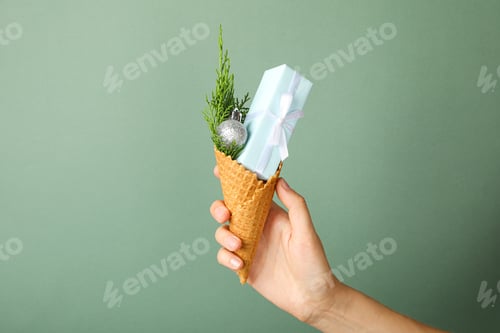 Preview: Waffle cone with a gift and a sprig of needles