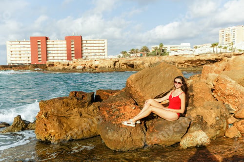 Preview: Portrait of a woman on the beach, ocean, unity with nature, healthy lifestyle