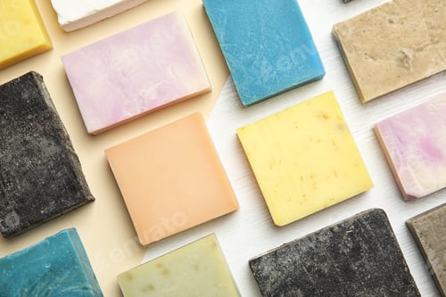 Preview: Hand made soap bars on color background, top view
