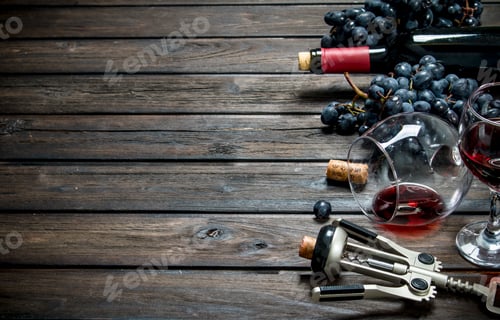 Preview: Wine background. Red wine with corkscrew.
