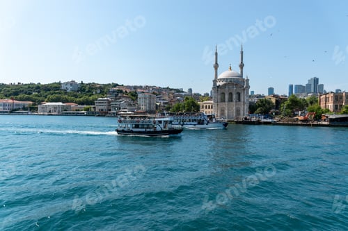 Preview: Sunny summer day Ortakoy mosque and ferry view from sea tour.