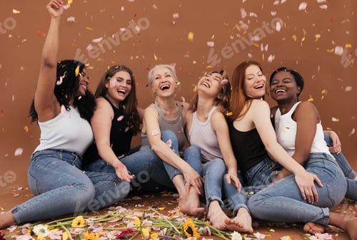 Preview: Group of happy women sitting on the brown background
