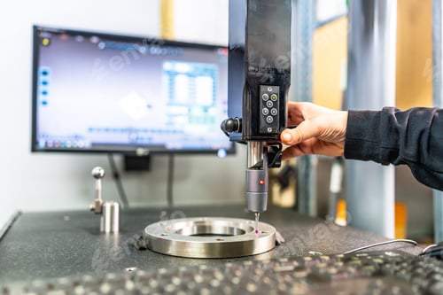 Preview: Technician working with three-dimensional verification and measuring machine