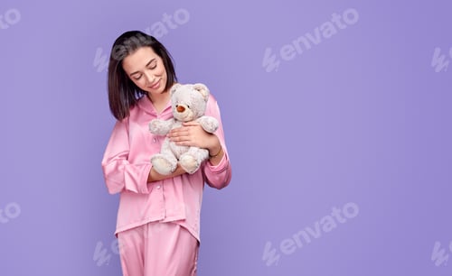Preview: Beautiful woman with teddy beard