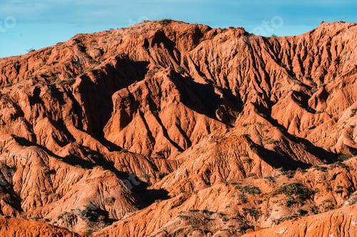 Preview: Landscape of eroded red sandstone mountain and rugged ridge during evening in Fairytale Canyon