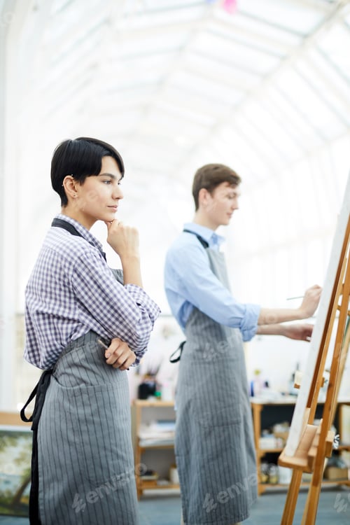 Preview: Pensive Female Artist in Studio