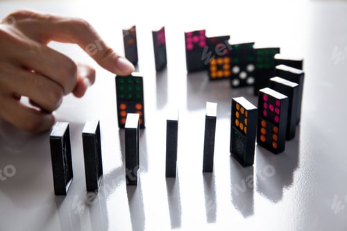 Preview: Man Hands playing domino on shiny desk