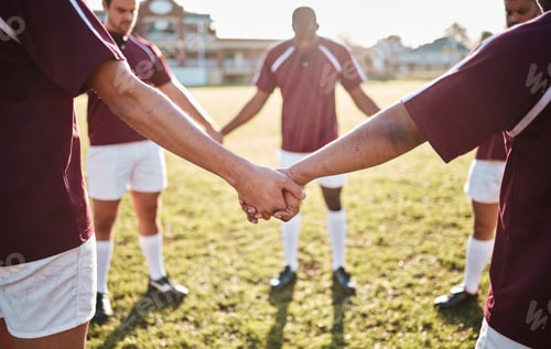 Preview: Man, team and holding hands for sports motivation, collaboration or coordination on grass field. Gr