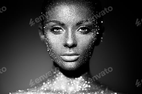 Preview: Portrait of beautiful woman with sparkles on her face