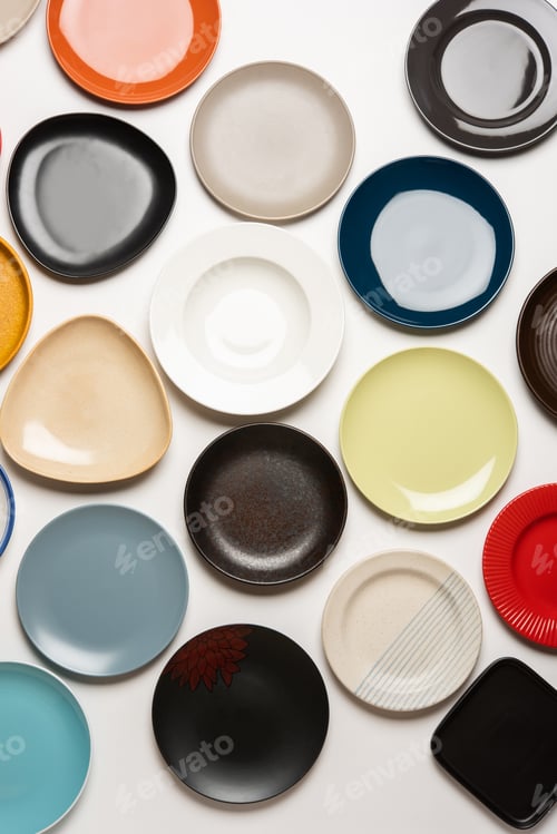 Preview: Group of Empty colourful ceramic plates top view