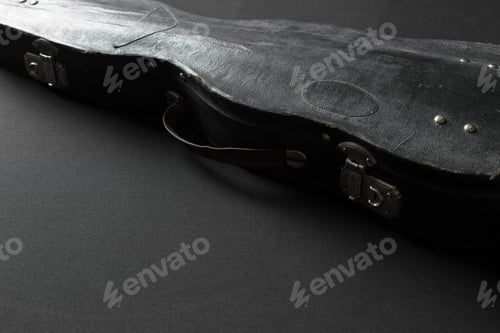 Preview: Old violin on a black background