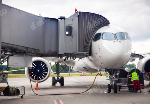 Preview: Airplane at the airport. Refueling and boarding of passengers. Trips. Aviation flights. Plane