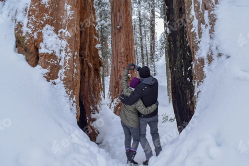 Preview: A couple enjoying and loving the snowy mountains.