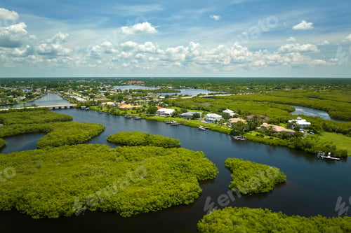 Preview: Aerial view of rural private houses in remote suburbs located near Florida wildlife