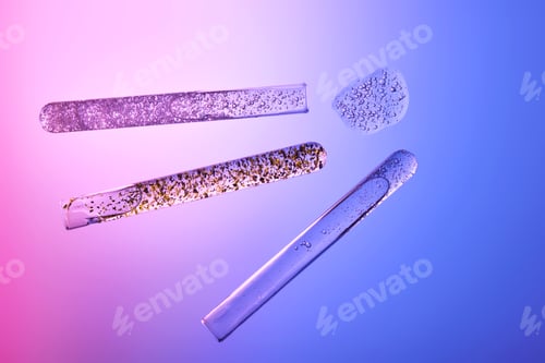 Preview: Textures of cosmetic serums in test tubes on a blue-purple background.