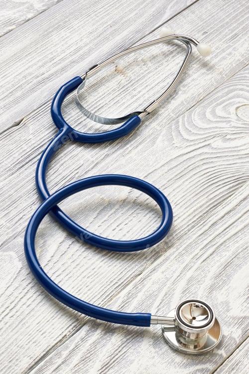 Preview: Stethoscope on white wooden background