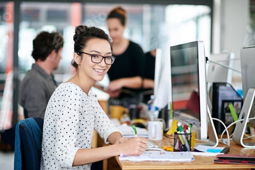Preview: Designers do it best. Portrait of a beautiful young woman working at her desk in an office.