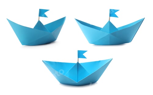 Preview: Light blue paper boats with flags on white background, collage