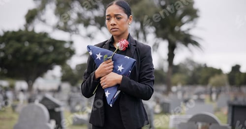 Preview: Funeral, rose and american flag with a woman at a cemetery in mourning at a memorial service. Sad,