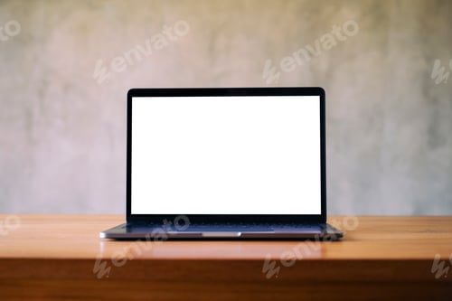 Preview: Mockup image of laptop with blank white desktop screen on wooden table with concrete wall background