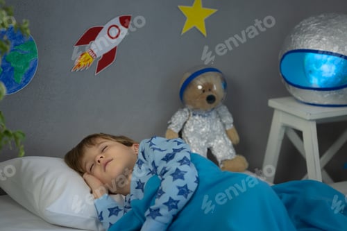 Preview: Happy child sleeping at home