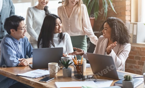 Preview: Professional afro woman sharing business ideas with colleagues