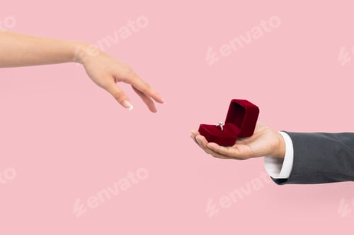 Preview: Engagement proposal hands with man and woman