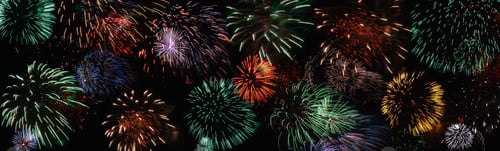 Preview: Colorful firework in black night sky, wide banner for holiday background