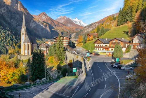 Preview: Amazing autumn landscape at Heiligenblut with St Vincent Church near Grossglockner mount .
