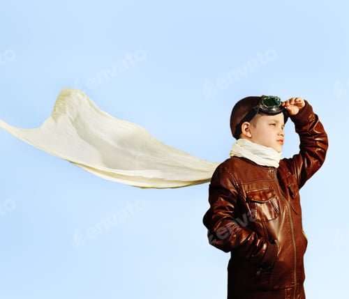 Preview: Little boy dreaming of becoming a pilot in retro style