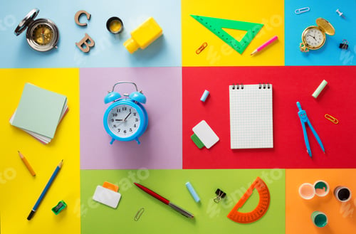 Preview: school supplies at abstract colorful background