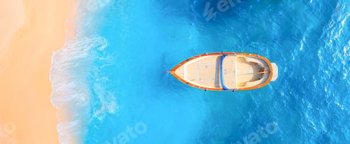 Preview: Drone view of a boat. Marine transport. Beach and waves. Vacation and holidays. Aerial landscape.