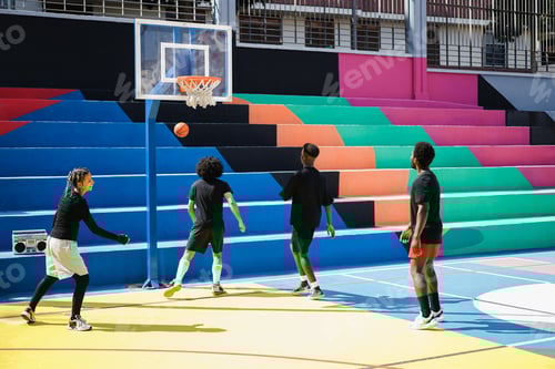 Preview: African friends playing basketball outdoor - Focus girl face