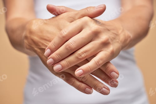 Preview: Lady is using a cosmetic hand moisturizer