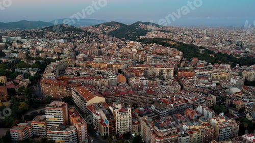 Preview: Aerial view of Barcelona city at dusk, Gracia and Horta Guinardo districts