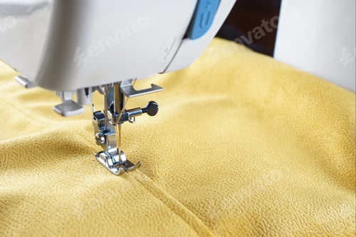 Preview: Modern Sewing Machine With Yellow Velours Fabric Close Up
