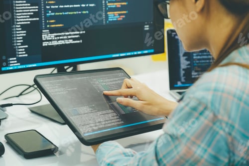Preview: Close up programmer is coding and programming software.