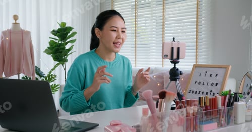 Preview: Asia woman micro influencer record live viral video camera at home studio