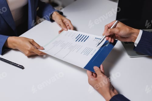 Preview: Recruitment professional reviewing job applicant's resume or cv