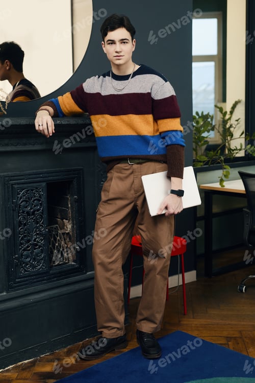Preview: Manager Standing In Office With Modern Interior