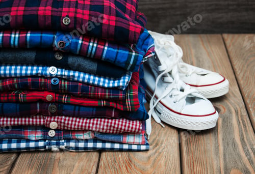 Preview: stacks of checkered colorful shirts