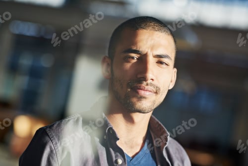 Preview: Business needs Ill take care of it. Portrait of a young businessman standing in his office.