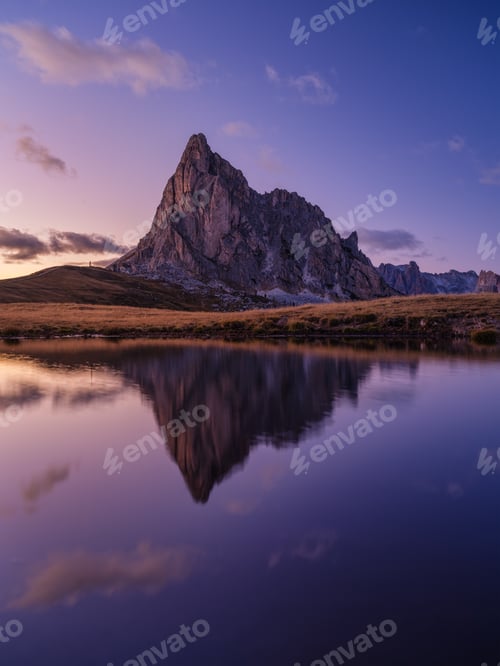 Preview: High mountains and reflection on the surface of the lake. Giau Pass, Dolomite Alps, Italy.