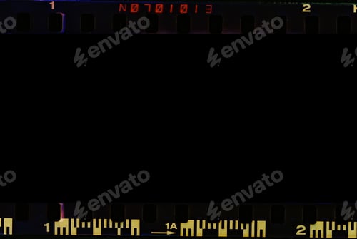 Preview: Real film border strip scan and old texture frame and isolated black space.