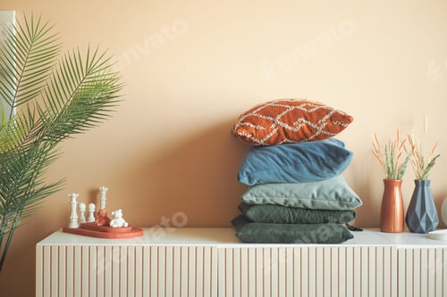 Preview: stack of colorful pillows on table