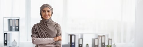 Preview: Confident Muslim Businesswoman Standing With Folded Arms Near Workplace