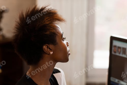 Preview: Woman working at computer, home office