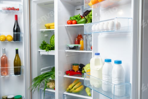 Preview: Open fridge full of fruits, vegetables and drinks